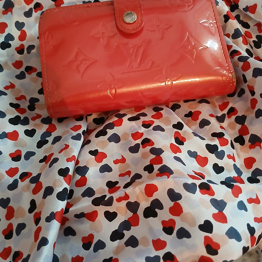 Pink LV Wallet with Snap Closure